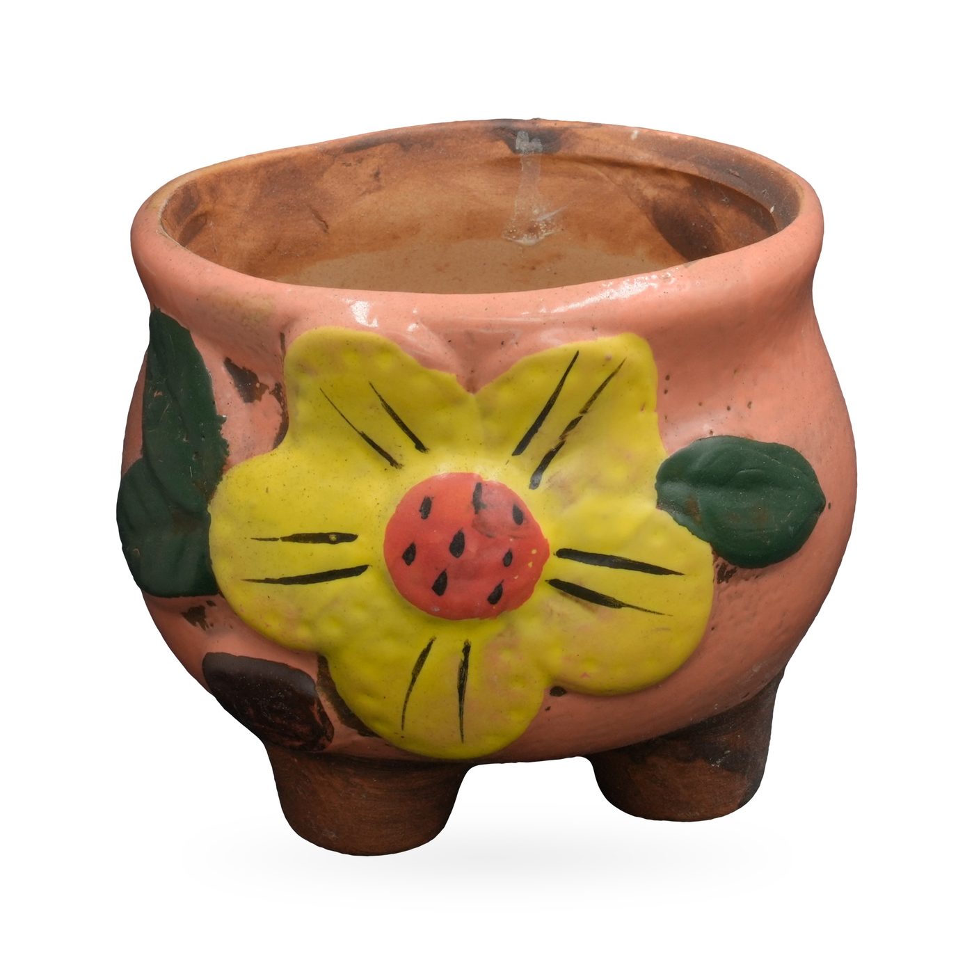 Salmon-pink painted terracotta footed pot with a raised yellow flower and green leaves