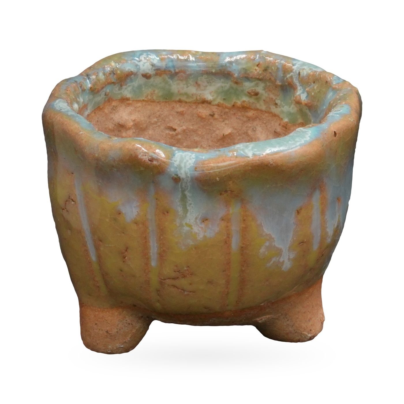 Mini ribbed mustard-tan pot with glossy pale-blue drip glaze and small terracotta clay feet