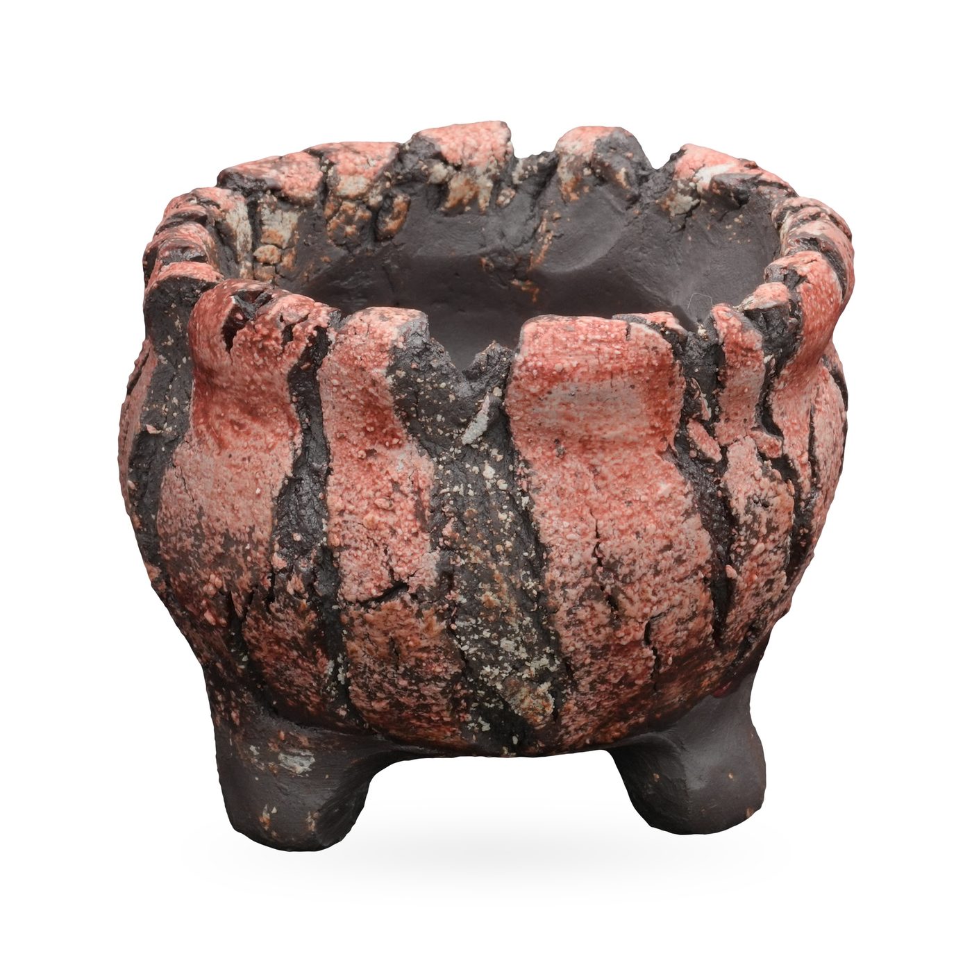 Round coral-pink and charcoal striped textured pot with scalloped rim and small dark feet