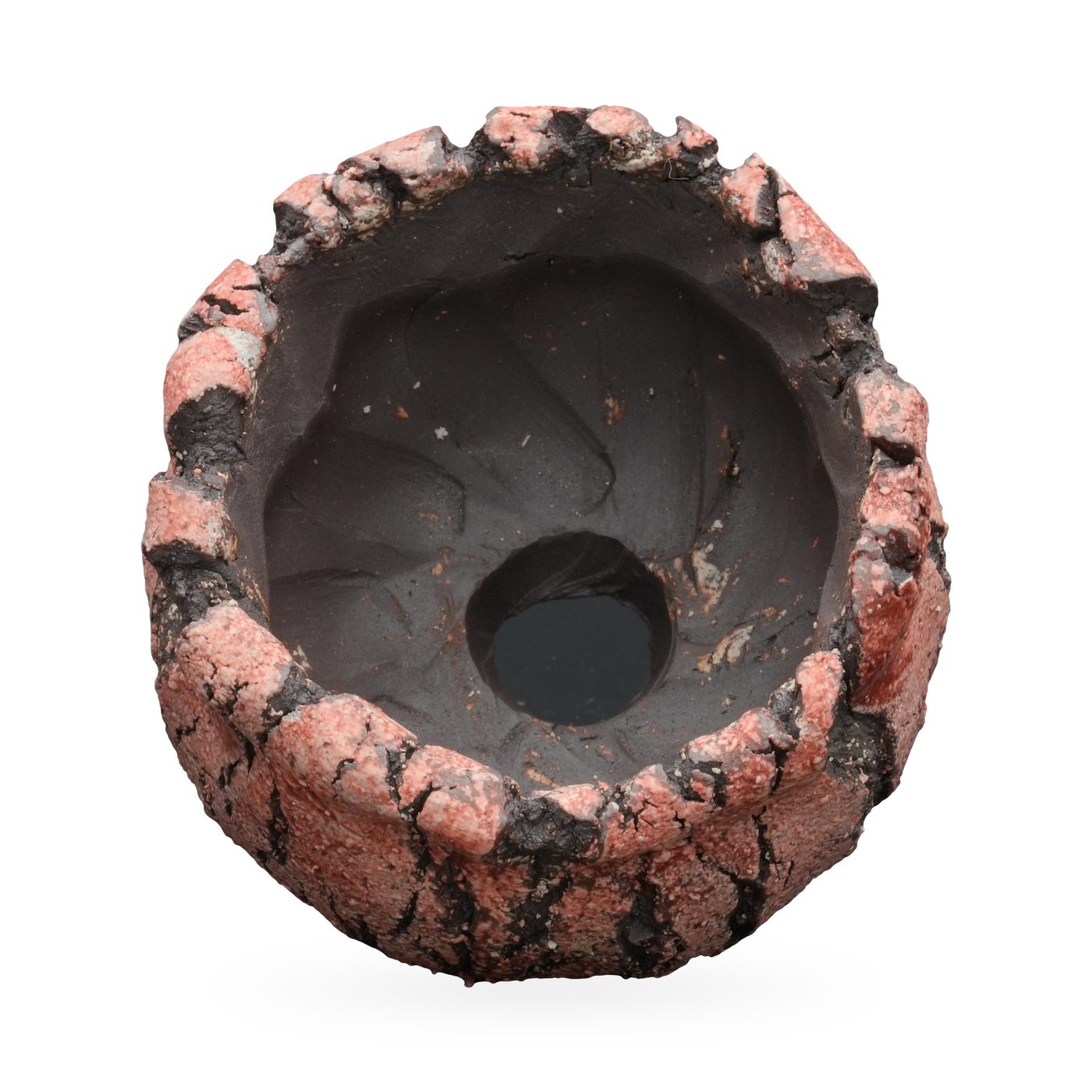 Round coral-pink and charcoal striped textured pot with scalloped rim and small dark feet – view 3