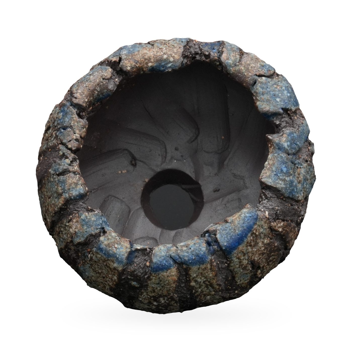 Low round footed pot with charcoal bark-like ridges and deep blue glaze touches around the rim – view 2