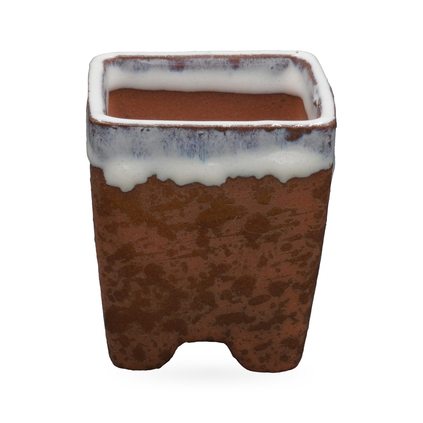 Speckled rust-brown square footed pot with glossy white drip glaze around the rim