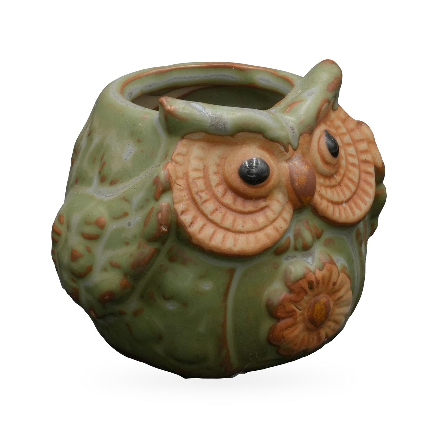 Mini sage-green ceramic owl planter with terracotta eye discs and a raised flower on the belly – view 2