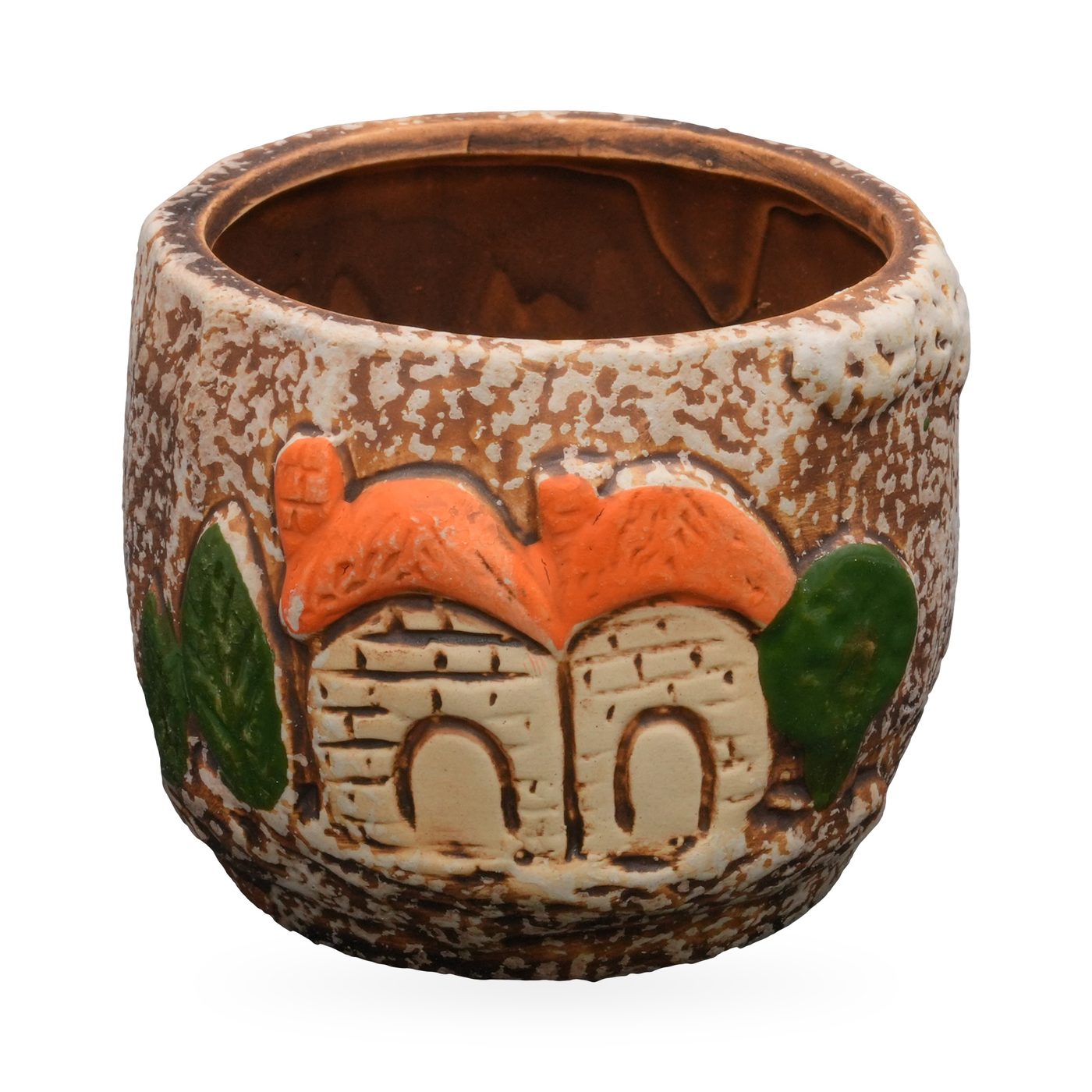 Round speckled cream and brown pot with raised cream cottages, orange roofs and green trees