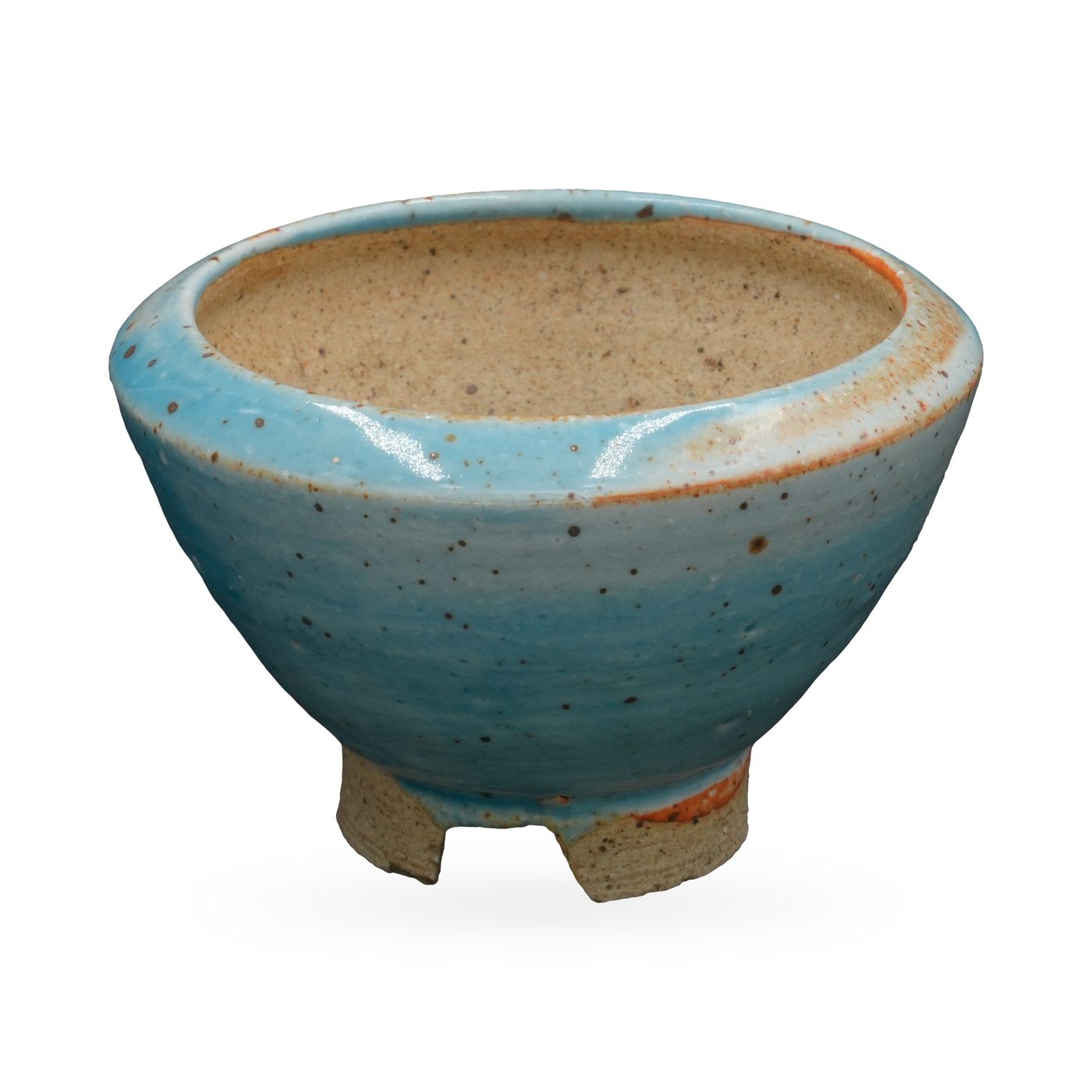 Wide footed bowl pot in speckled glossy sky-blue glaze with a sandy interior and clay feet – view 2
