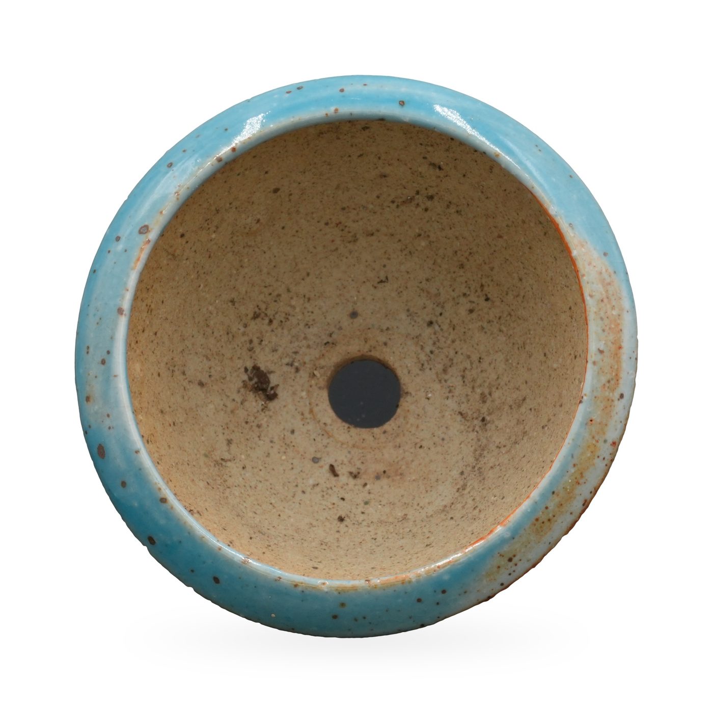 Wide footed bowl pot in speckled glossy sky-blue glaze with a sandy interior and clay feet – view 3