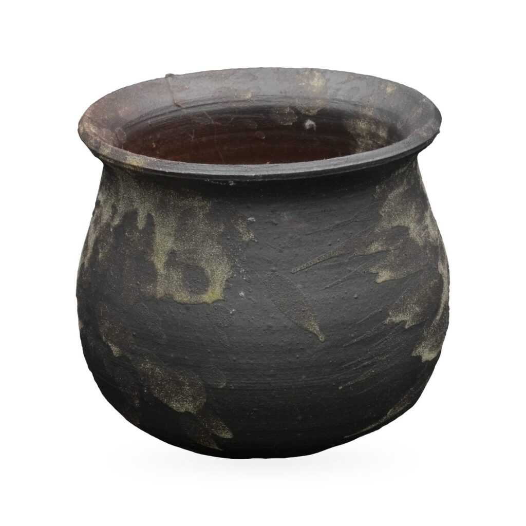 Round-bellied matte charcoal pot with khaki-gold splashes and a flared rim