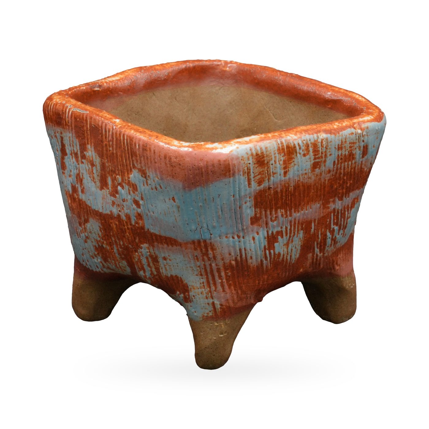 Square pot with combed texture in burnt orange and pale blue, on short clay feet – view 2
