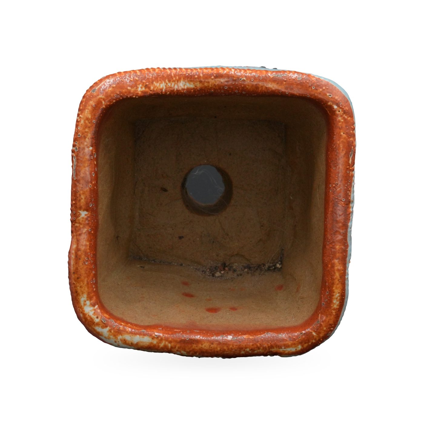 Square pot with combed texture in burnt orange and pale blue, on short clay feet – view 3