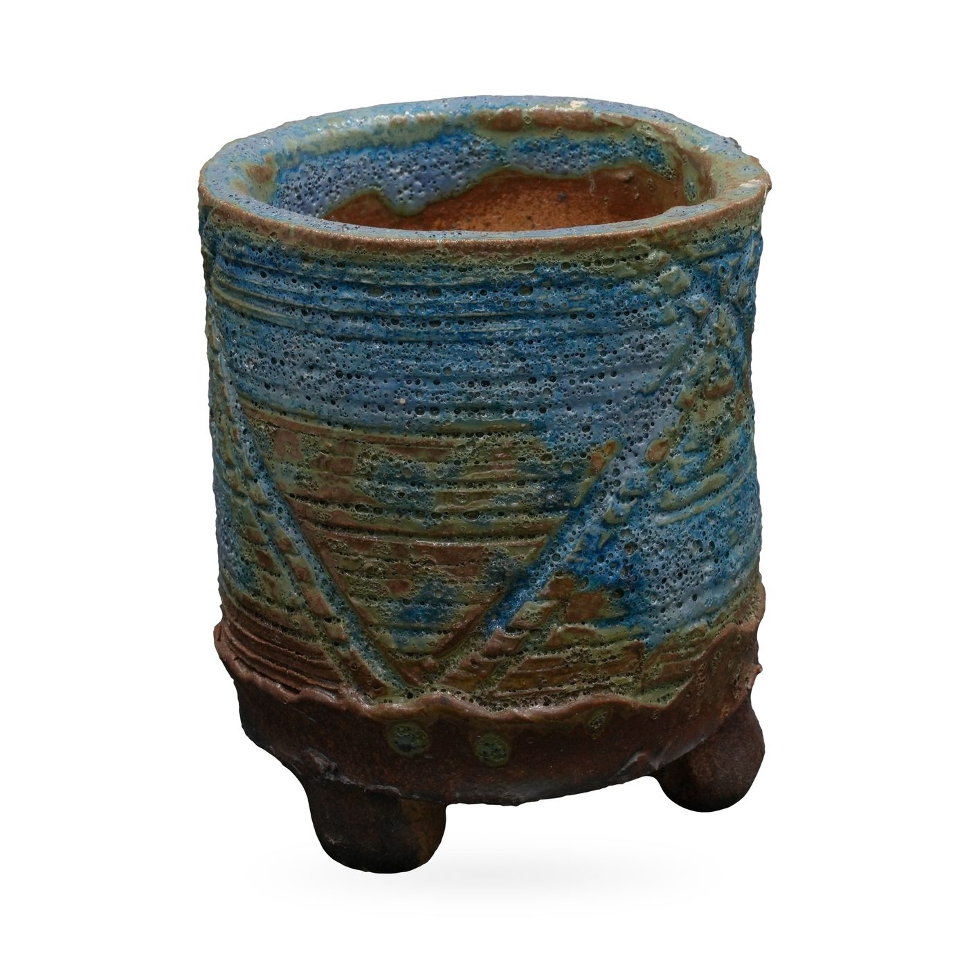Tall blue-green cylinder pot with pitted lava-style glaze, raised X pattern and dark brown footed base – view 2
