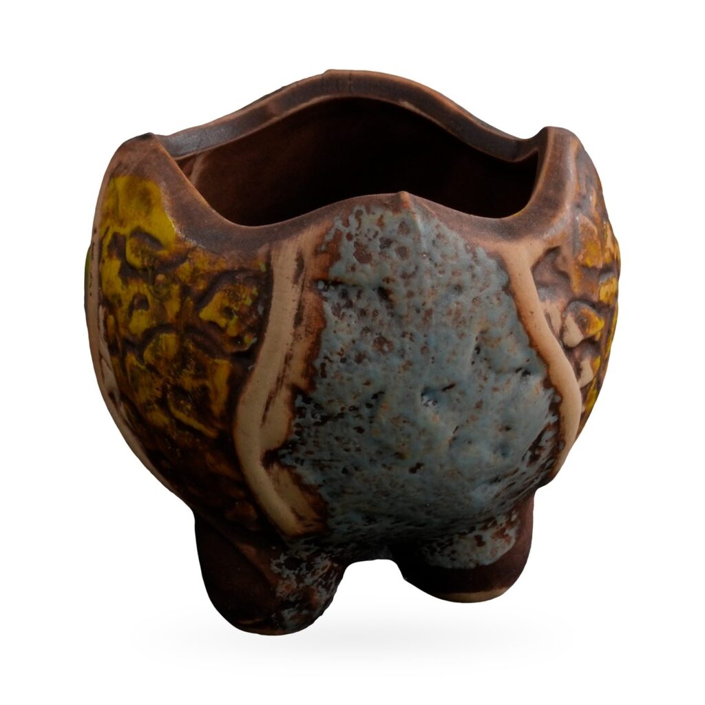 Mini lobed succulent pot with blue-grey and mustard glaze panels divided by raised cream lines
