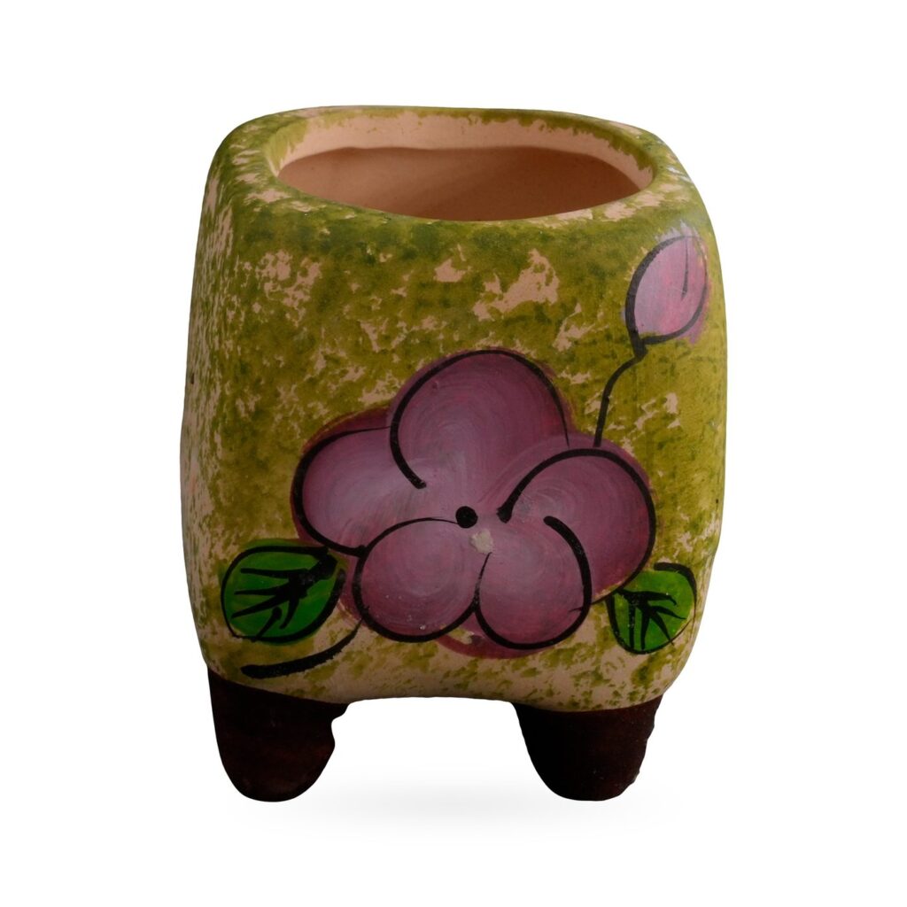 Mottled green rounded-square footed pot with a painted mauve-pink flower, 6×6.5cm