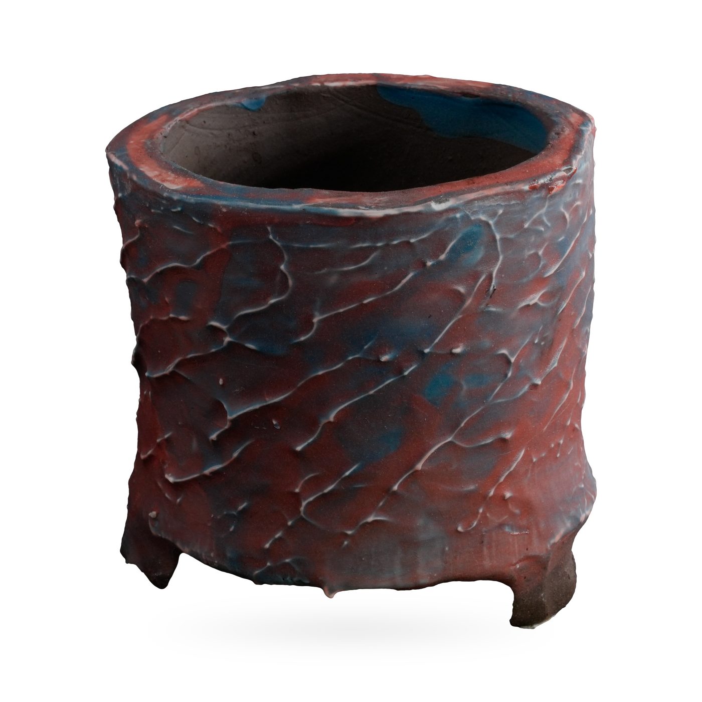 Footed cylinder pot with mottled rust-red and slate-blue bark-texture glaze, 10×9.5cm