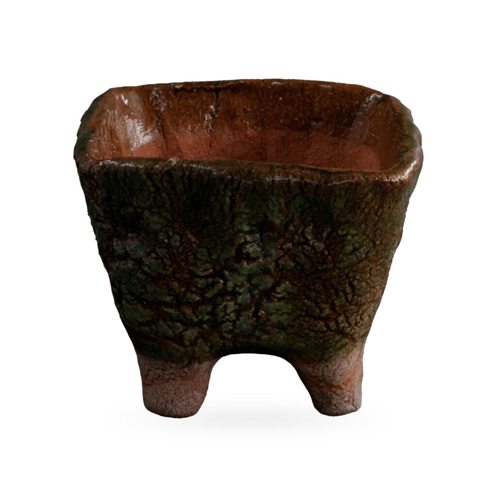 Square green crackle-glaze pot on unglazed terracotta feet, 11×8.5cm