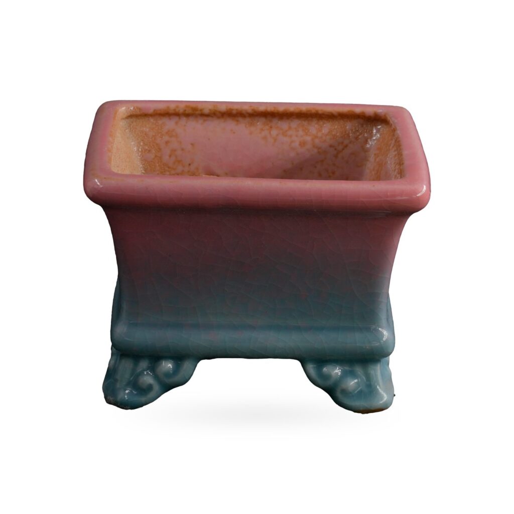 Rectangular bonsai-style pot fading from pink to powder blue on scroll feet, 9×6cm