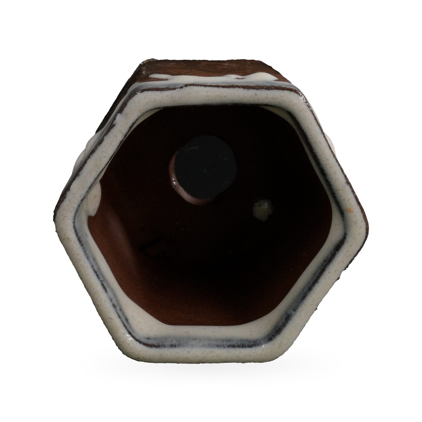 Hexagonal dark brown textured pot with thick white glaze dripping from the rim – view 3