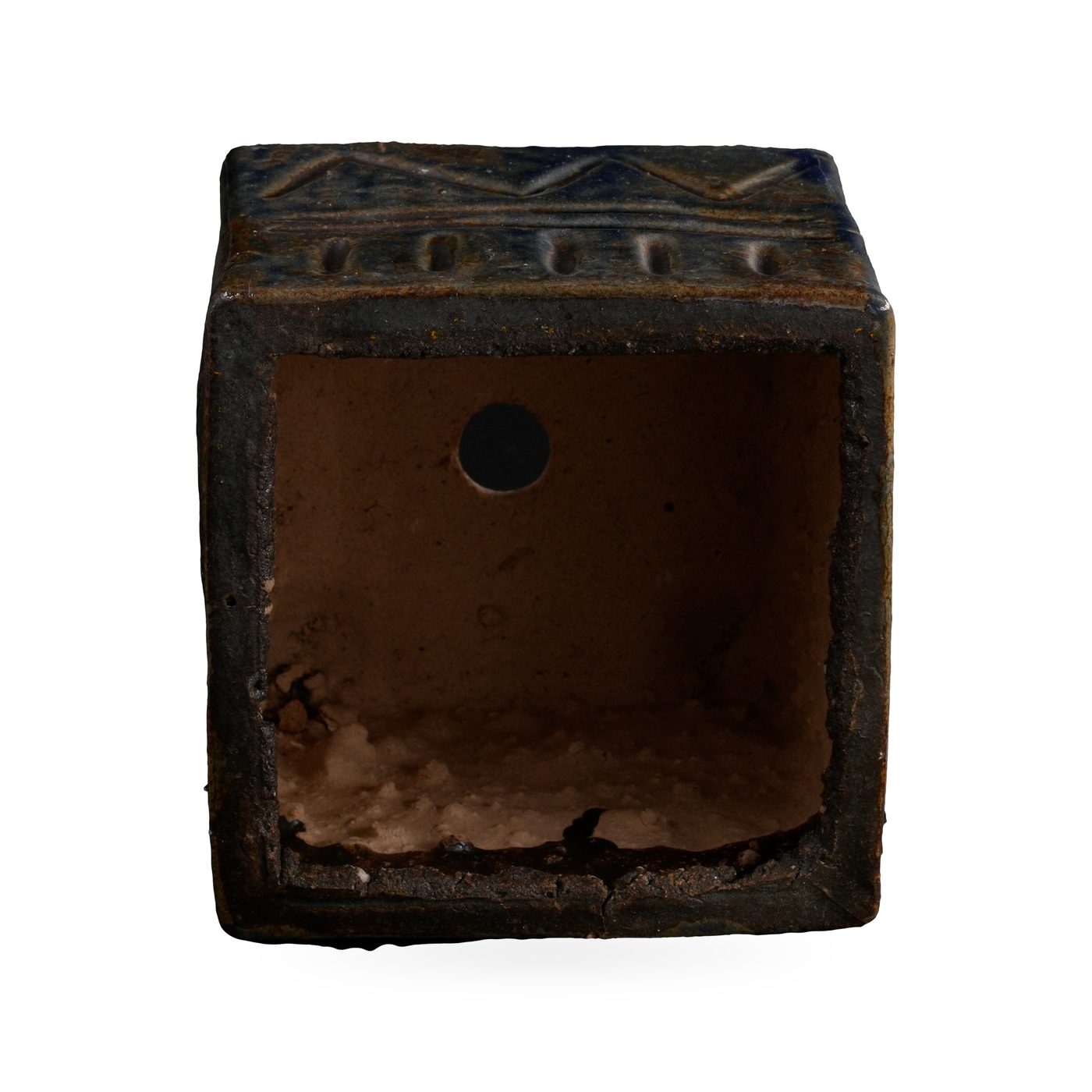 Square dark blue-black glazed pot with a textured zigzag and band pattern on small feet – view 3
