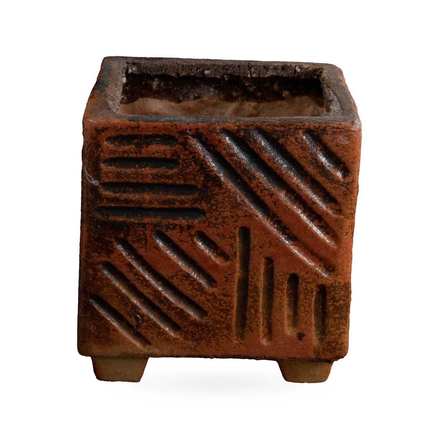 Speckled rust-orange square pot with carved line grooves, standing on small feet