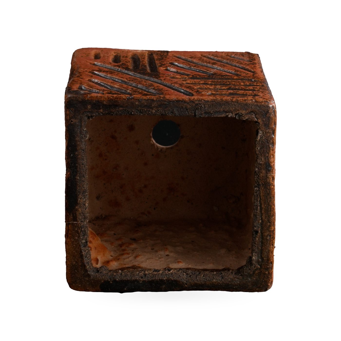 Speckled rust-orange square pot with carved line grooves, standing on small feet – view 3