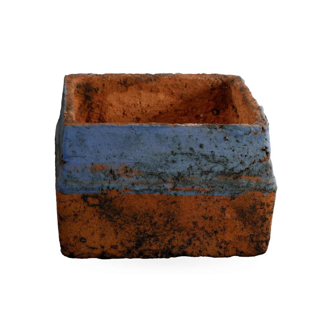 Low orange square pot with dark mottling and a dusty periwinkle-blue band around the upper sides