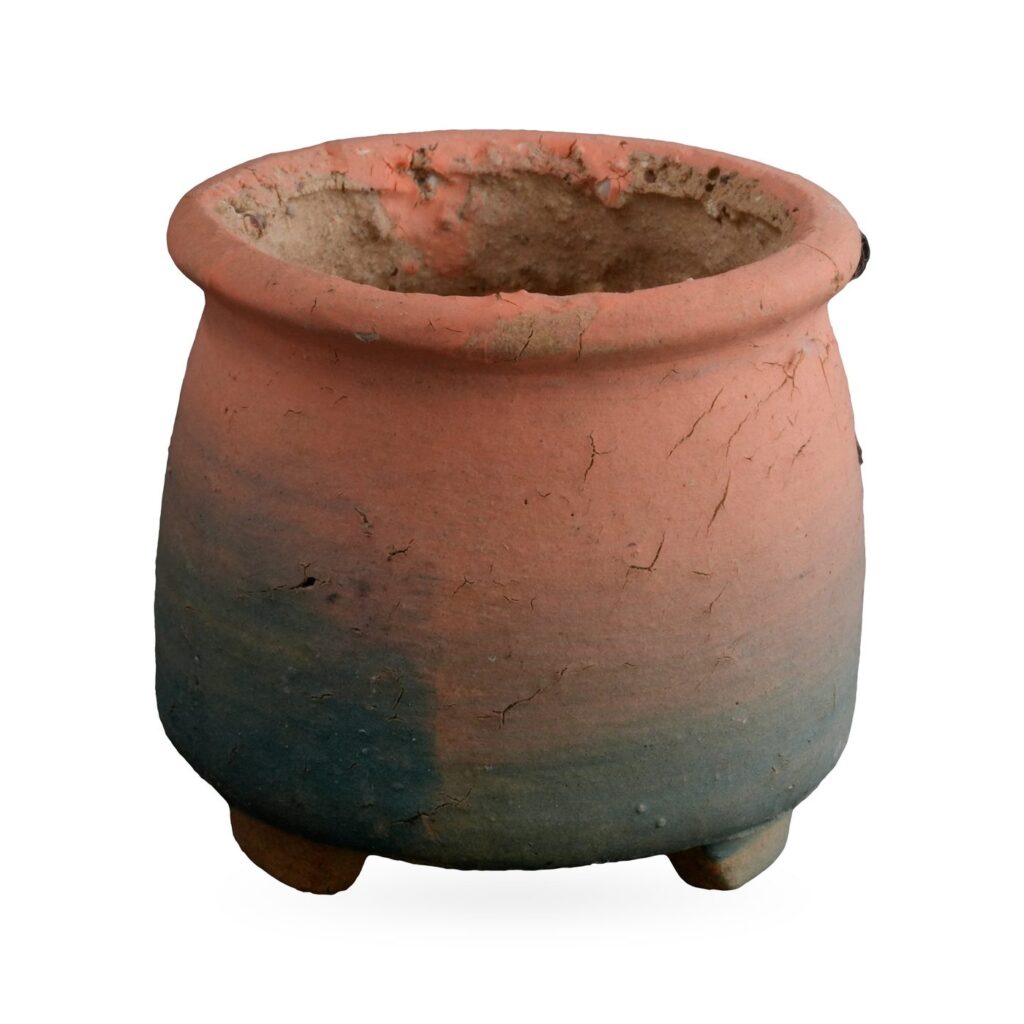 Coral pink to teal ombré footed succulent pot with a rough rolled rim and bare clay interior