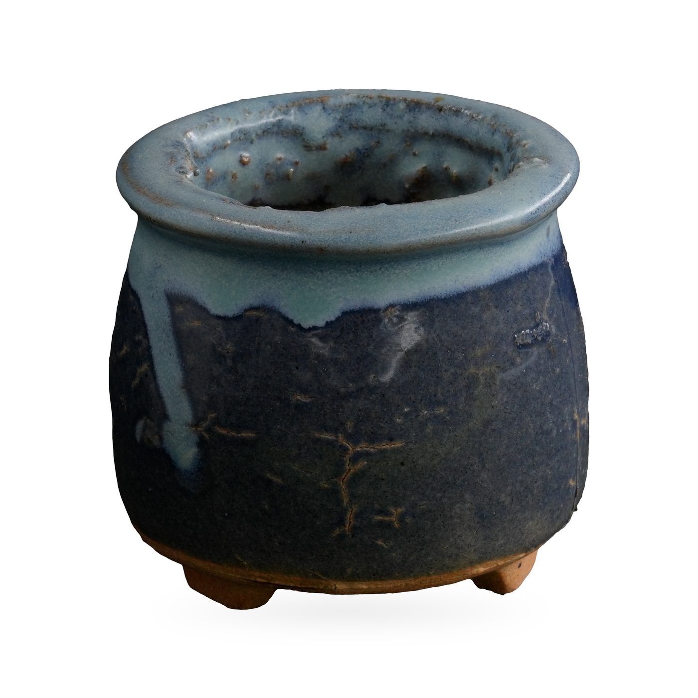 Navy blue footed succulent pot with glossy pale sky-blue glaze dripping down from the rim – view 2