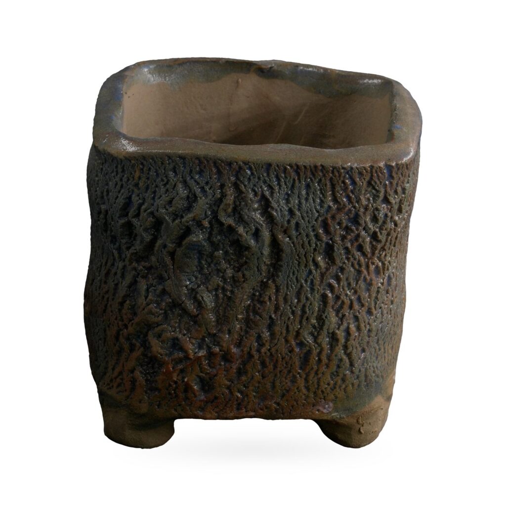 Square footed succulent pot with deep bark-like texture in mottled charcoal, rust and slate blue