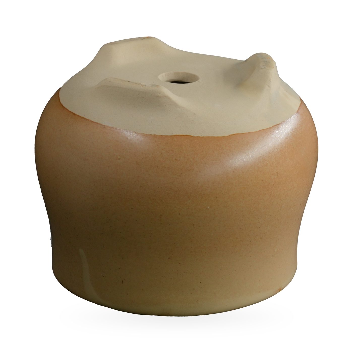 Ochre-yellow footed pot with painted black flowers and a small brown seal-style plaque – view 3