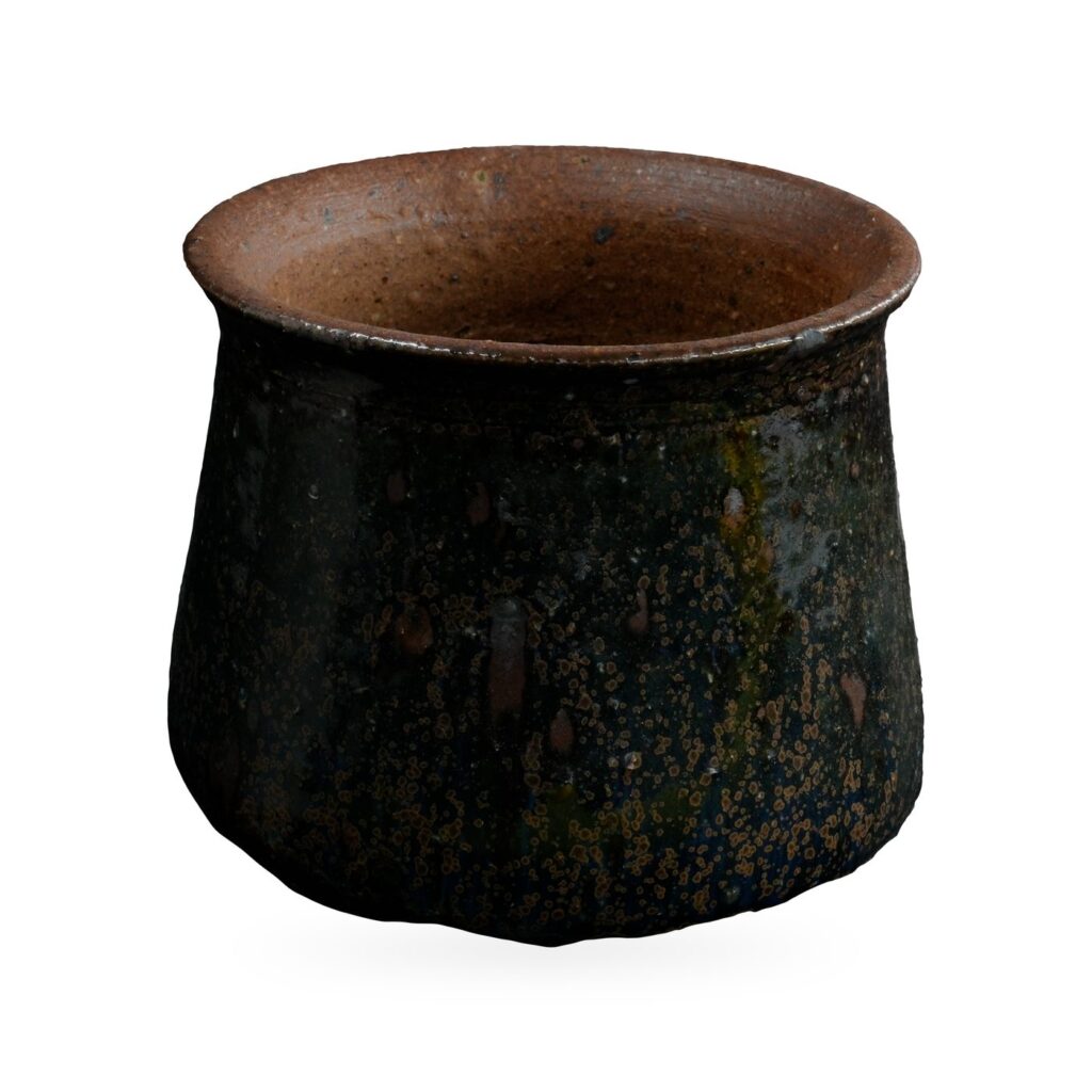 Glossy dark green speckled glaze pot with flared natural brown clay rim