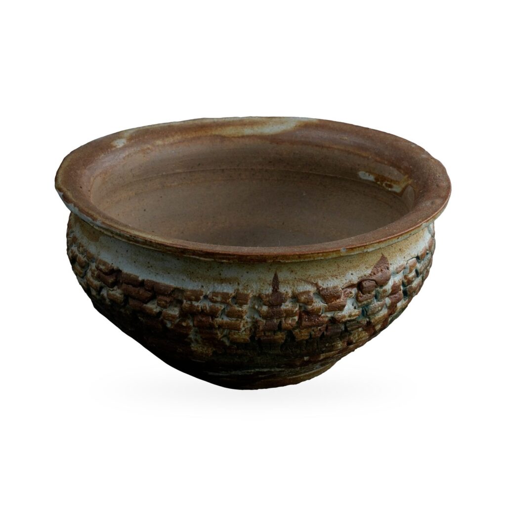 Wide rustic bowl pot with brick-like relief band and mottled rust-brown and grey glaze