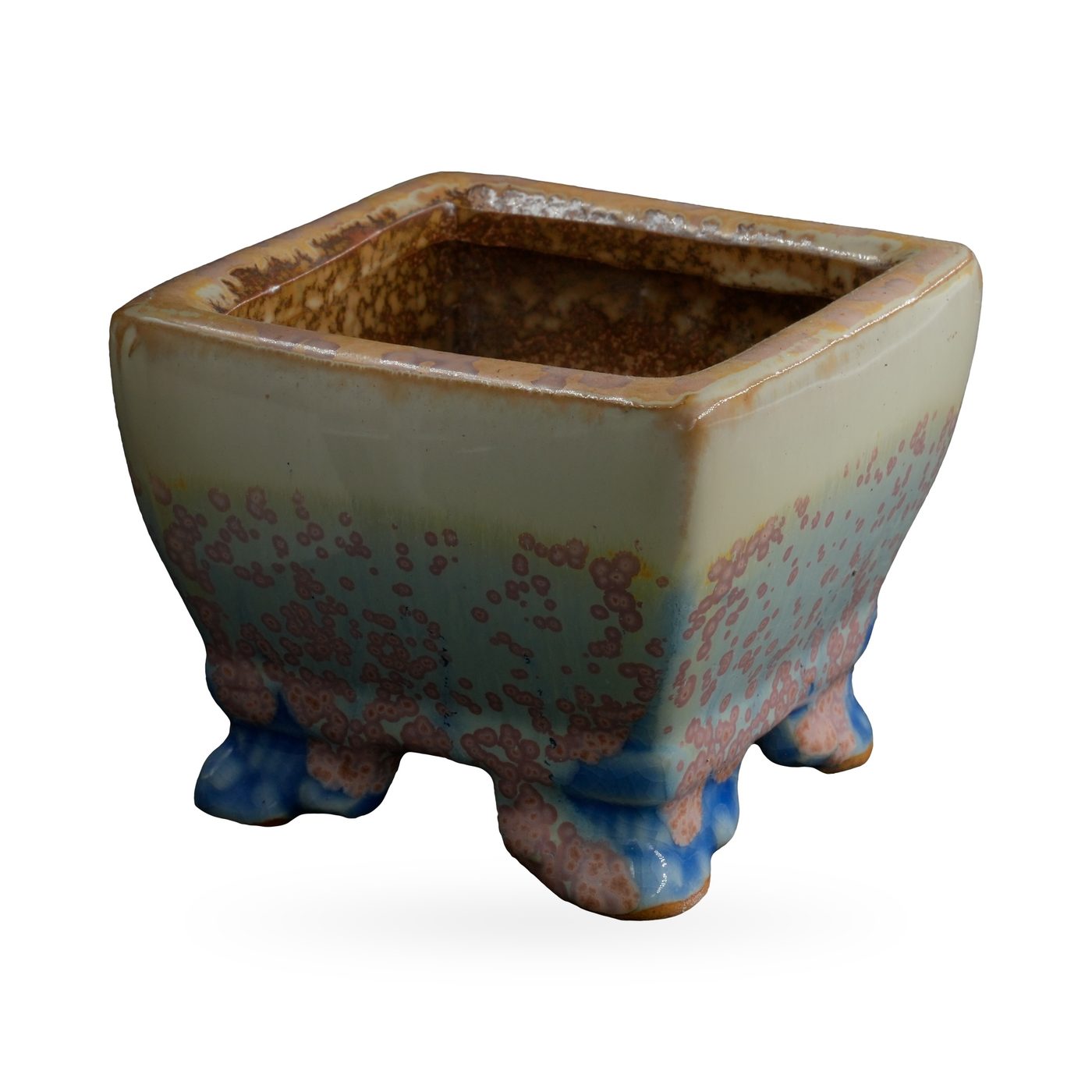 Square pot in pale cream glaze with pink-mauve speckles over soft blue, on small blue-toned feet – view 2