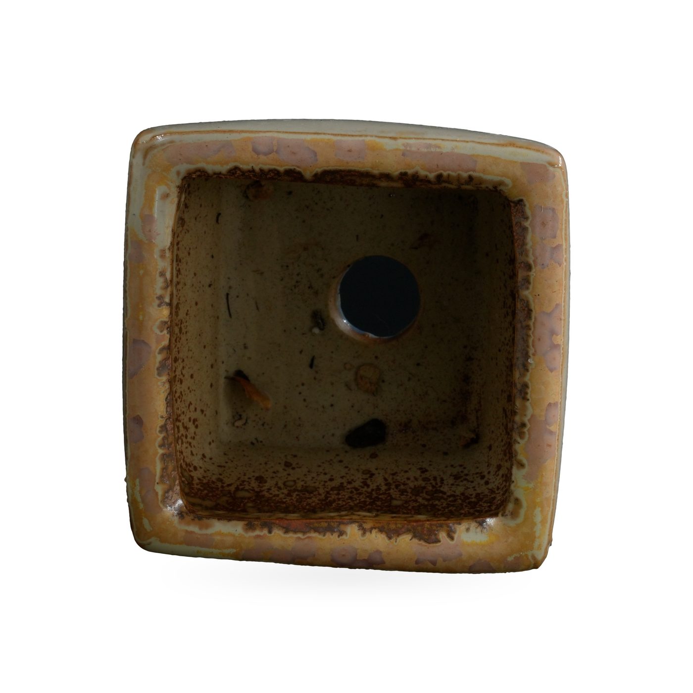 Square pot in pale cream glaze with pink-mauve speckles over soft blue, on small blue-toned feet – view 3