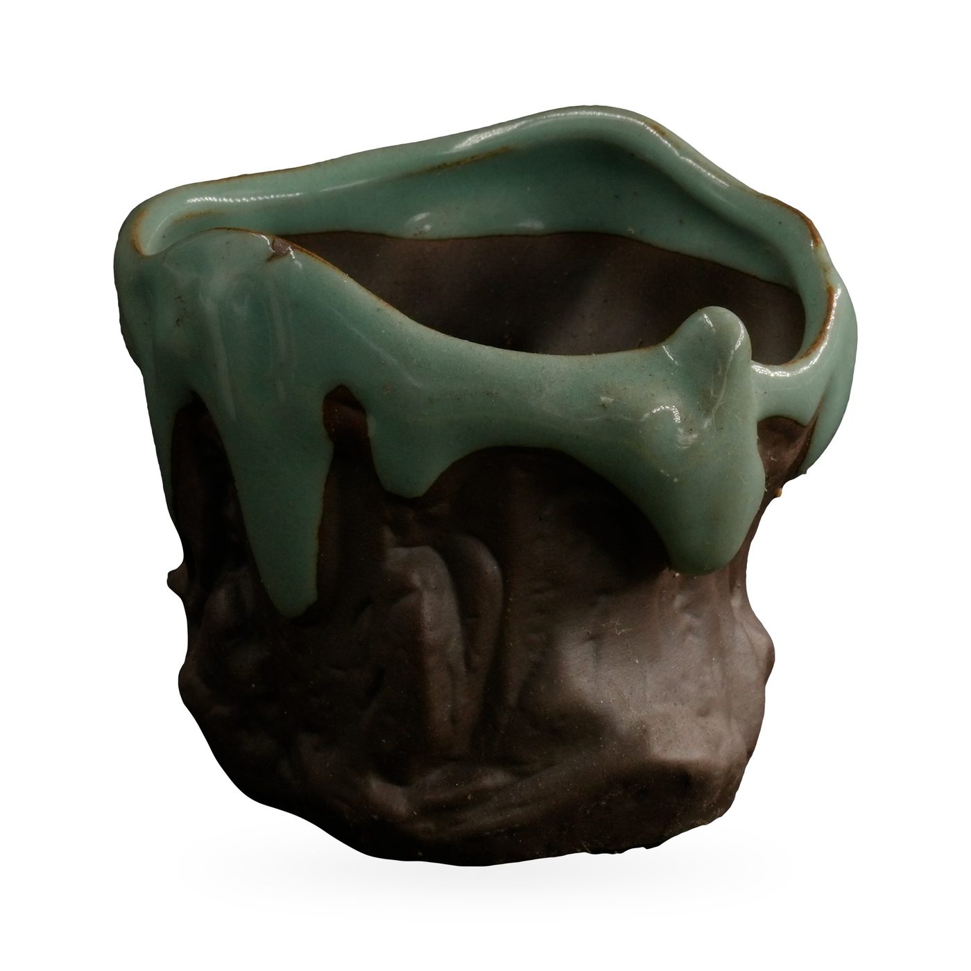 Freeform succulent pot with glossy jade-green drip glaze over a dark brown rock-textured body