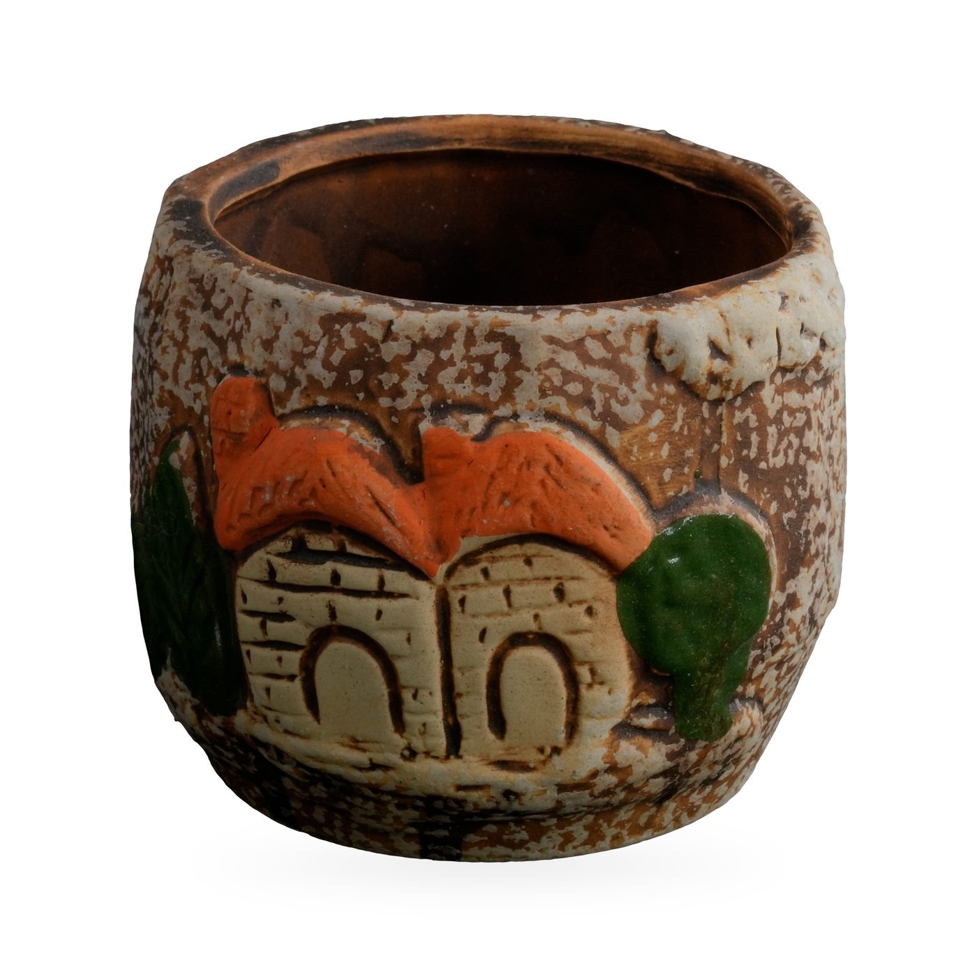 Round speckled brown succulent pot with raised cream cottages, orange roofs and green shrubs