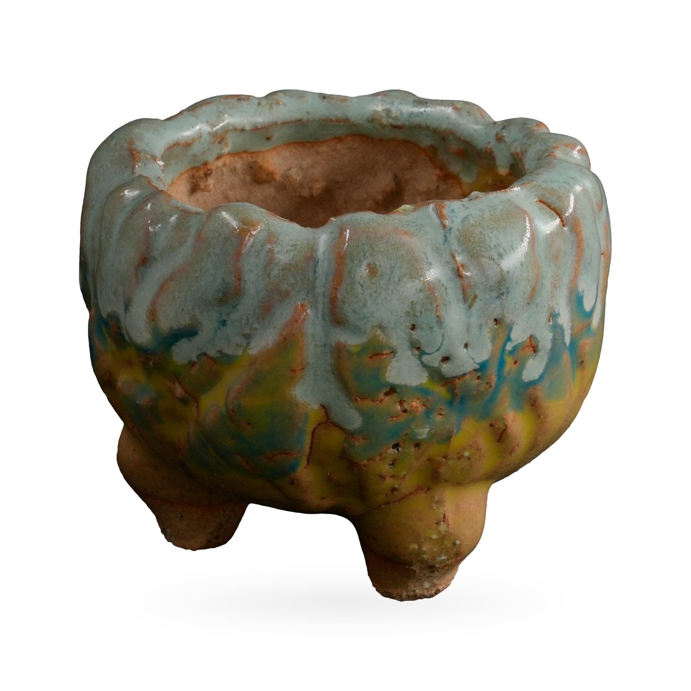 Footed textured pot with pale duck-egg blue drip glaze over ochre-yellow and teal bands