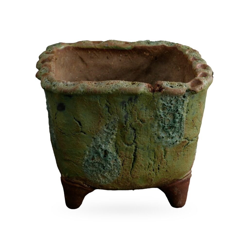Square moss-green bark-texture footed pot with blue-green lava-style patches