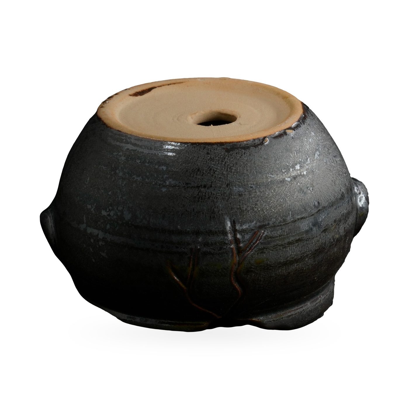 Round glossy black glazed pot with raised brown branch relief and side lug knobs – view 3