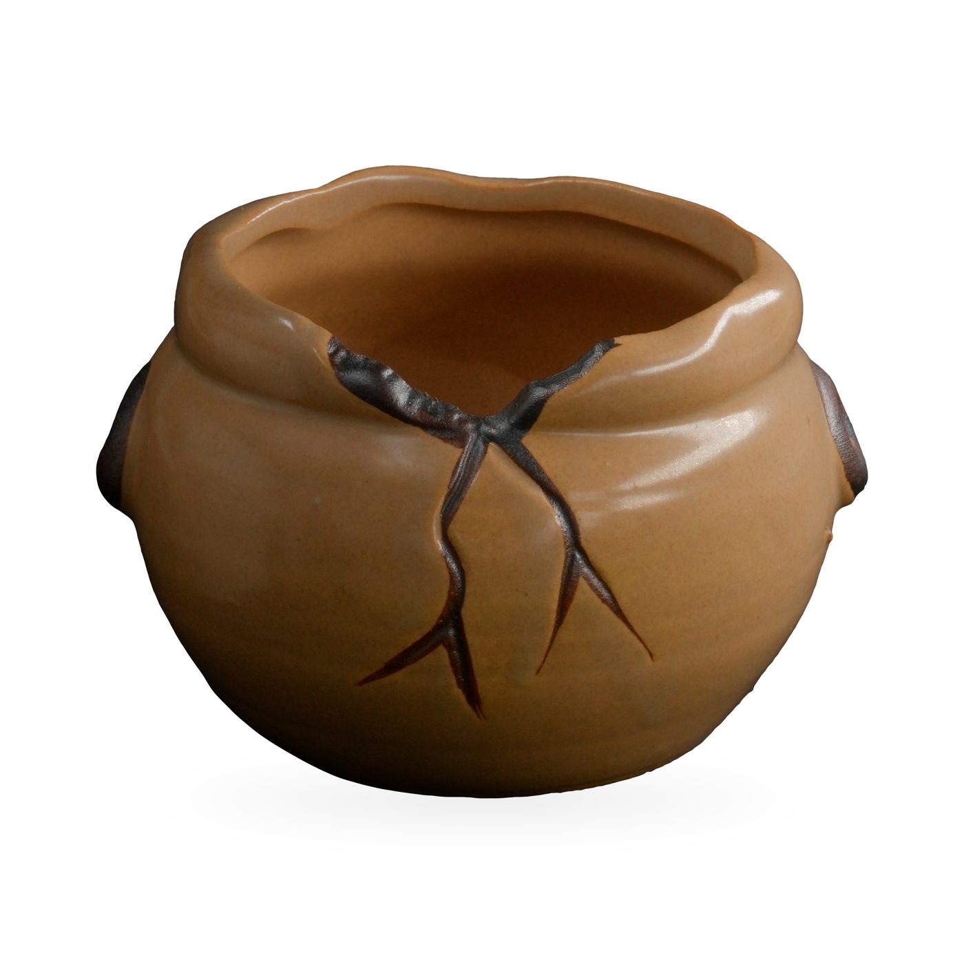 Small round caramel glazed pot with dark brown branch relief and side lugs
