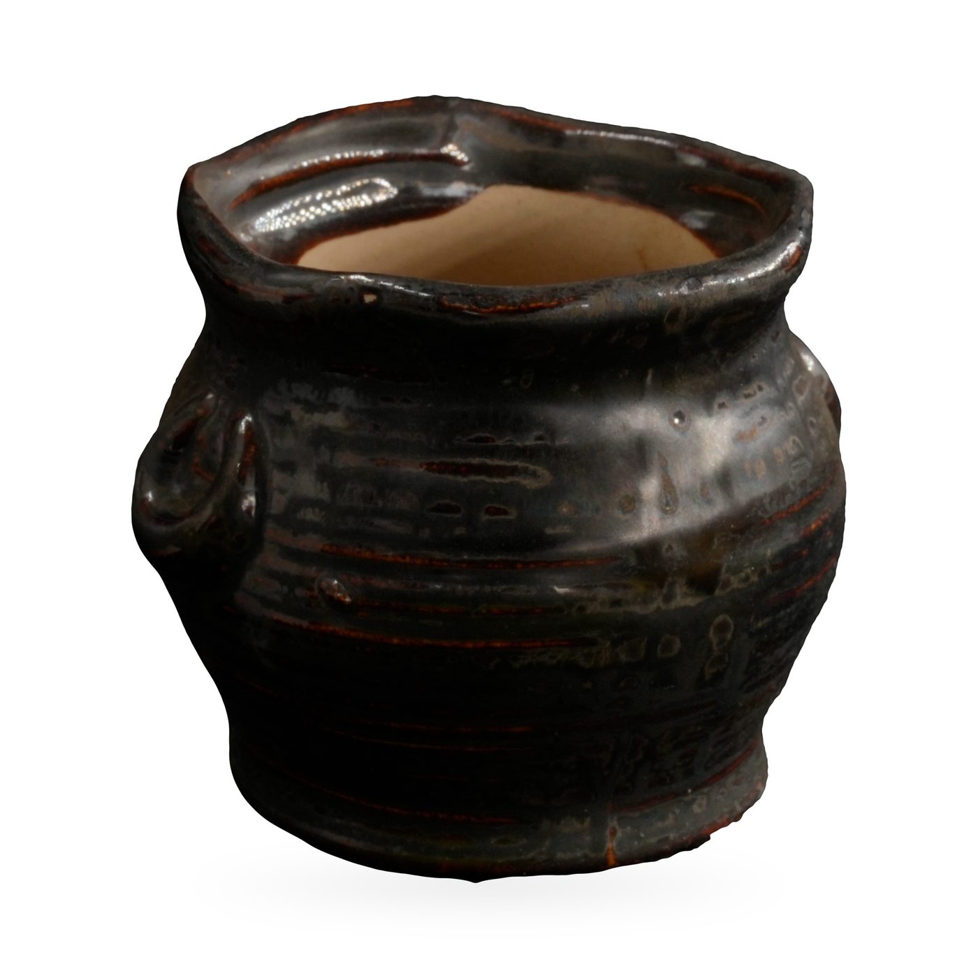 Small black-brown glazed rustic pot with textured body, wavy rim and two small loop ears – view 2