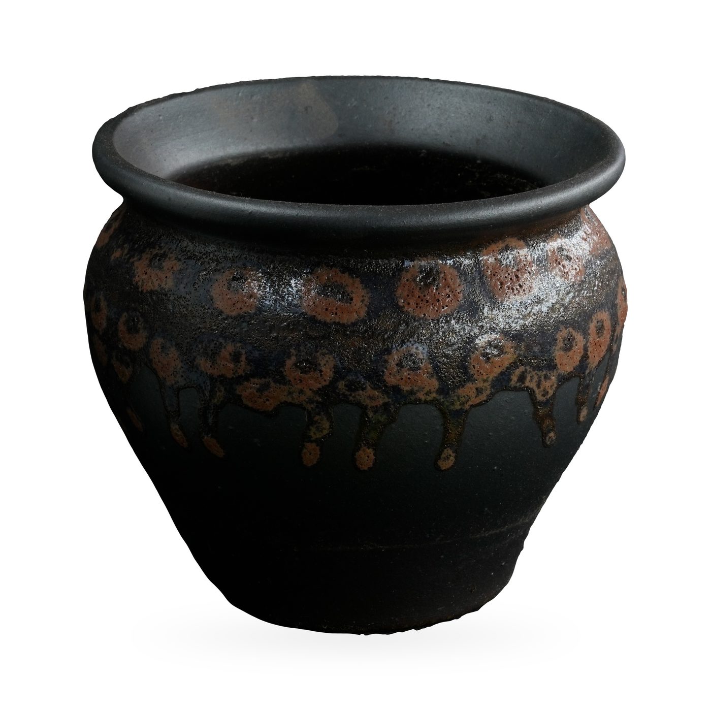 Round matte black pot with a rust-orange spotted drip glaze band and rolled rim