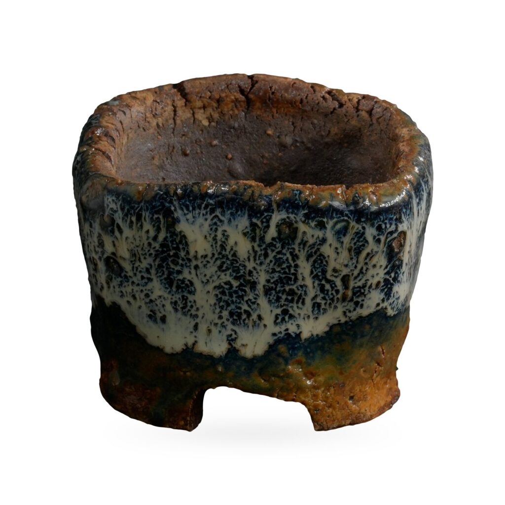Mini square pot with cream-white and navy drip glaze over rust-brown clay on low feet