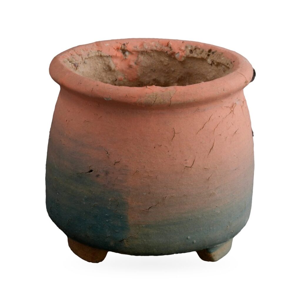 Coral pink to teal ombré footed succulent pot with a rough rolled rim and bare clay interior