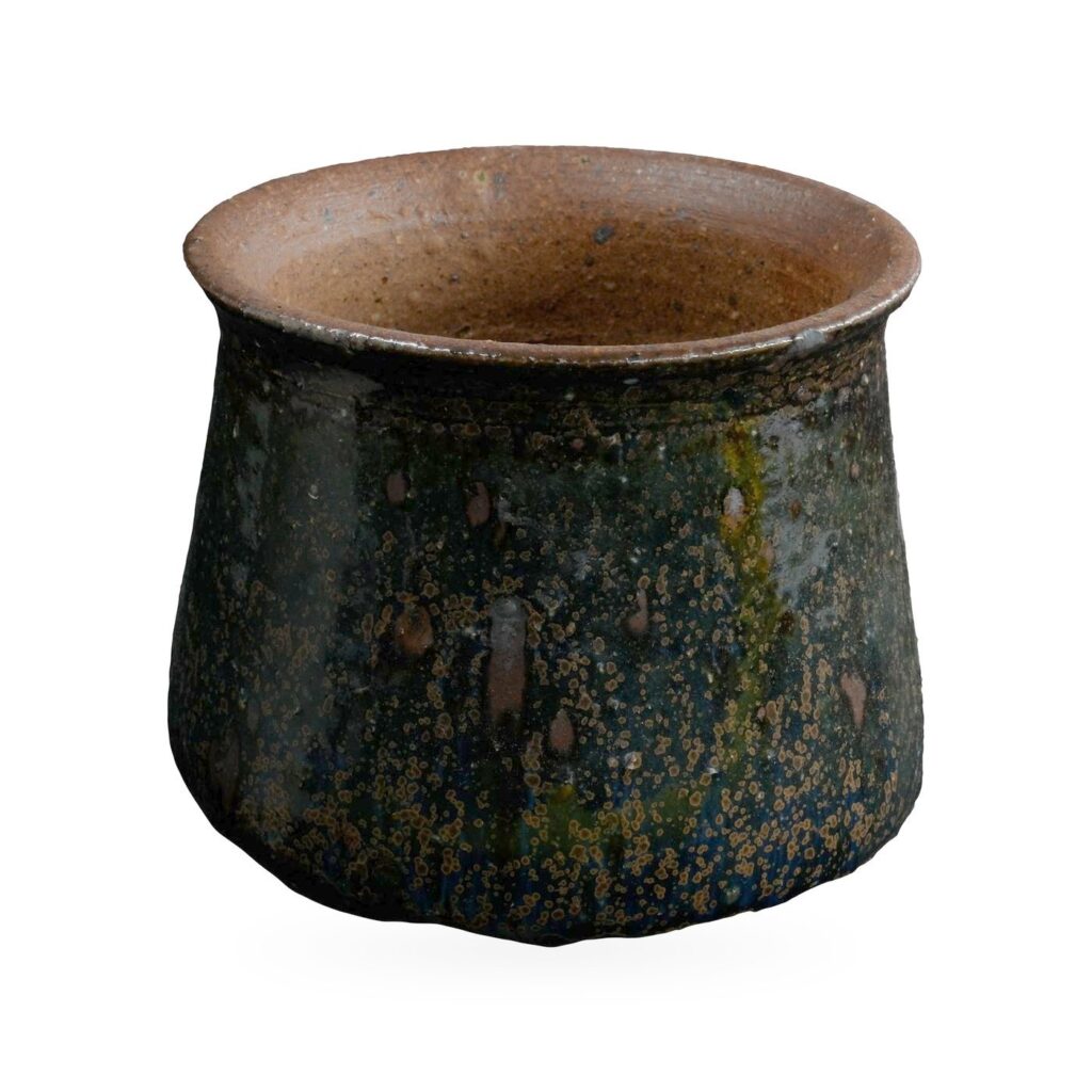 Glossy dark green speckled glaze pot with flared natural brown clay rim