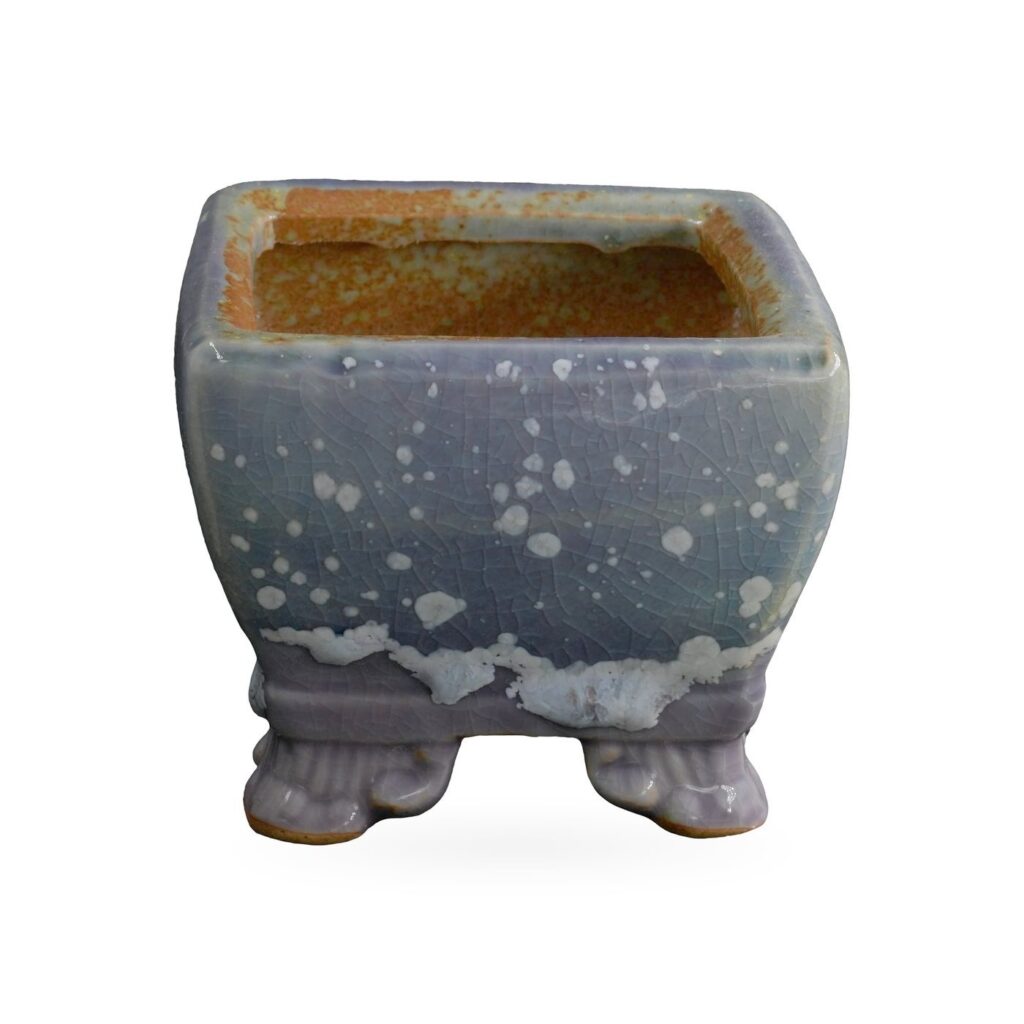Square blue-grey speckled glazed succulent pot with lilac-purple base band on scroll feet