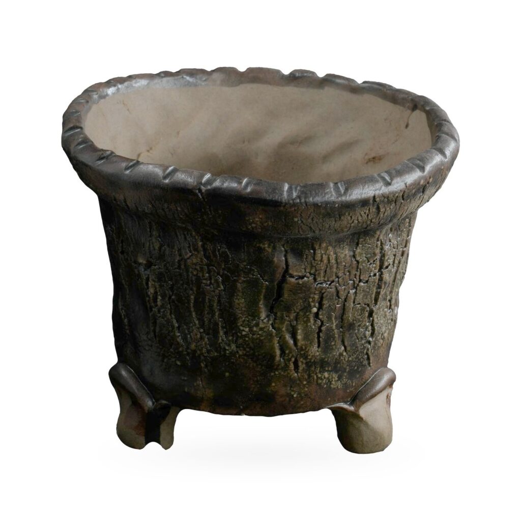 Tapered dark brown bark-texture pot with scalloped rim on small scrolled feet