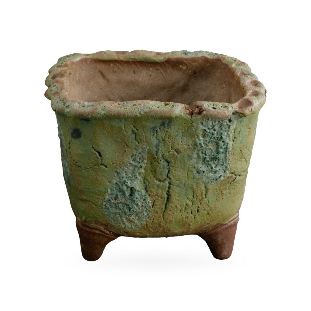Square moss-green bark-texture footed pot with blue-green lava-style patches