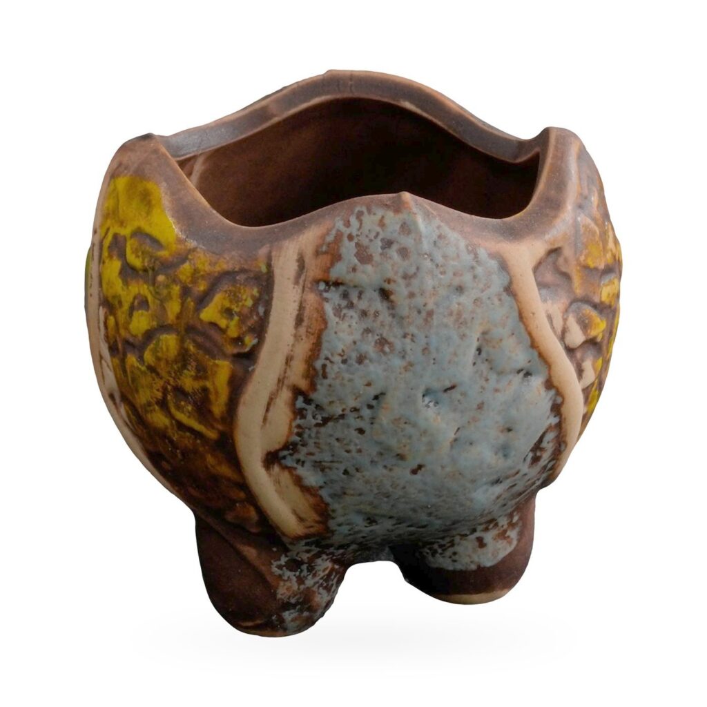 Mini lobed succulent pot with blue-grey and mustard glaze panels divided by raised cream lines