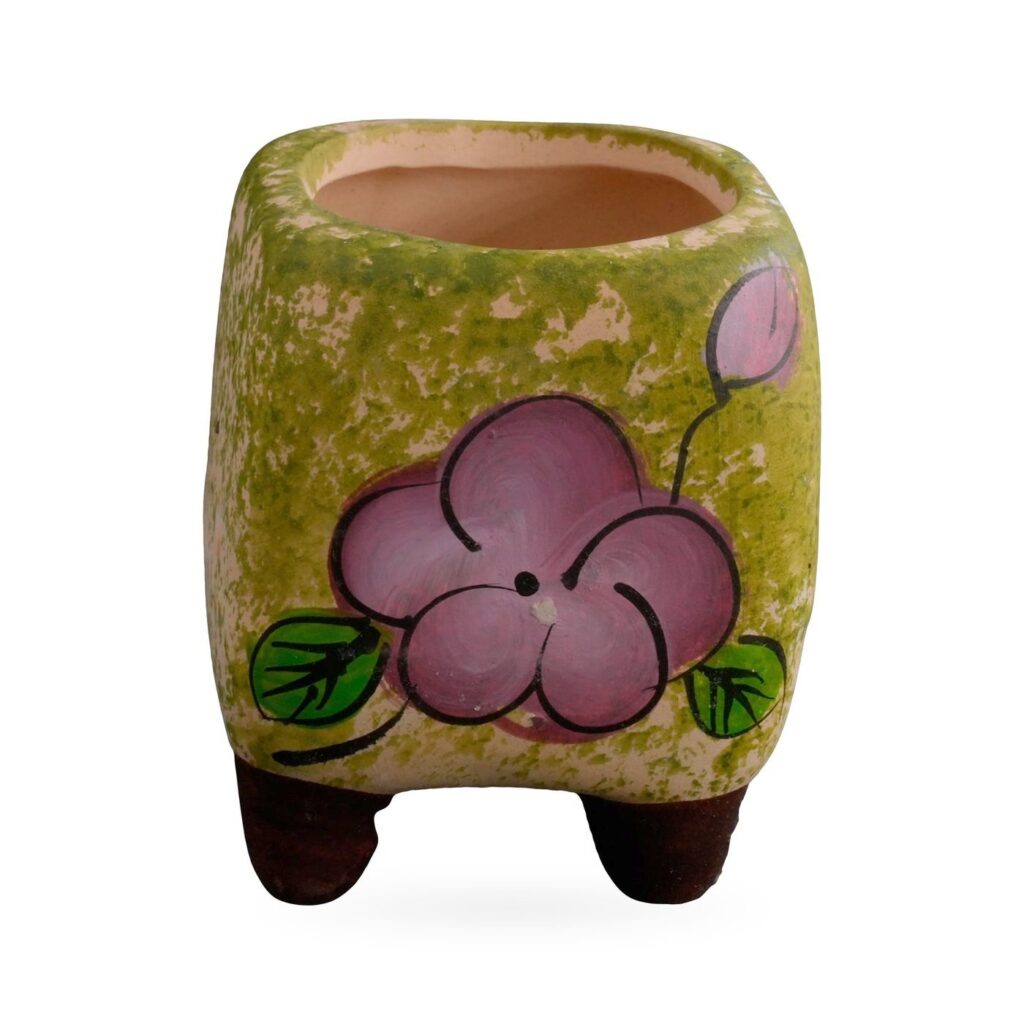 Mottled green rounded-square footed pot with a painted mauve-pink flower, 6×6.5cm
