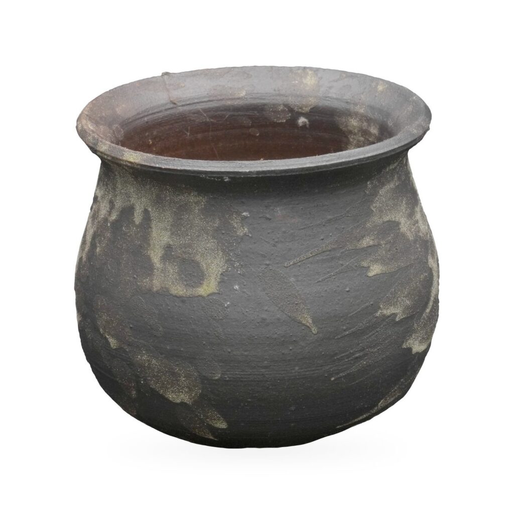 Round-bellied matte charcoal pot with khaki-gold splashes and a flared rim