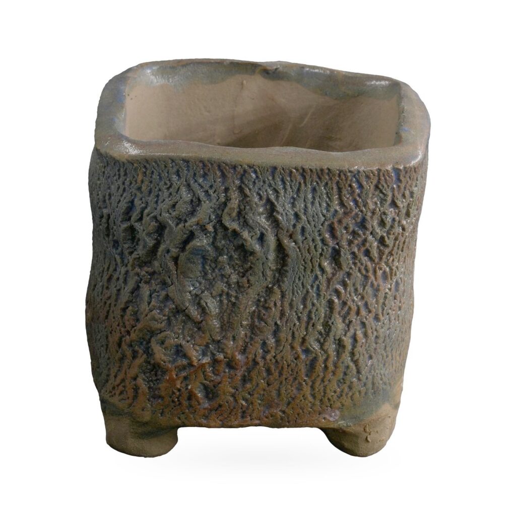 Square footed succulent pot with deep bark-like texture in mottled charcoal, rust and slate blue